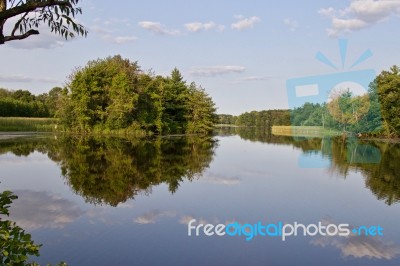 Background With An Amazing Lake And Forest Stock Photo
