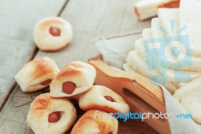 Baked Bread On Wooden Stock Photo