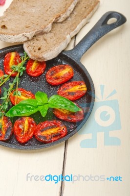 Baked Cherry Tomatoes With Basil And Thyme Stock Photo