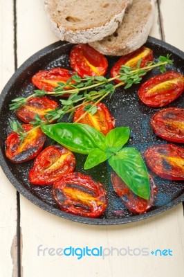Baked Cherry Tomatoes With Basil And Thyme Stock Photo
