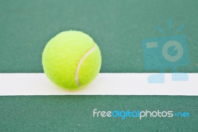 Ball On Tennis Court Stock Photo