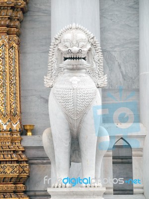 Bangkok, Thailand - July 31:the Over 150 Years Ancient Marble Lion Standing At Front Of Main Temple At Benjamaborphit Temple,bangkok, Thailand. July 31, 2012 Stock Photo