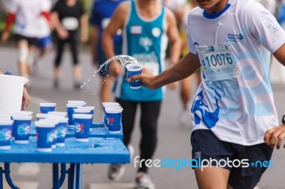 Bangkok, Thailand - November 17 : Unidentified Runner Catching U… Stock Photo