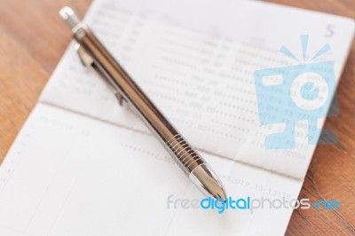 Bank Account Passbook With Pen Stock Photo