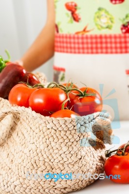 Basket Of Tomatoes Stock Photo