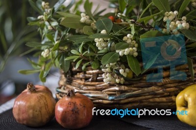 Basket With Strawberry Tree Branches Stock Photo Basket With Strawberry Tree Branches Stock Photo