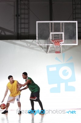 Basketball Player Carry Ball Stock Photo