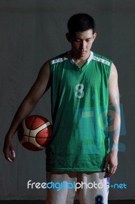 Basketball Player Hold Ball For Shoot Stock Photo