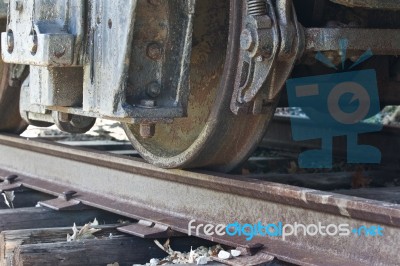 Beautiful Background With Old Rusty Wheels Of A Train And The Railway Stock Photo Beautiful Background With Old Rusty Wheels Of A Train And The Railway Stock Photo