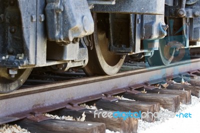 Beautiful Background With The Old Train Wheels And The Road Stock Photo