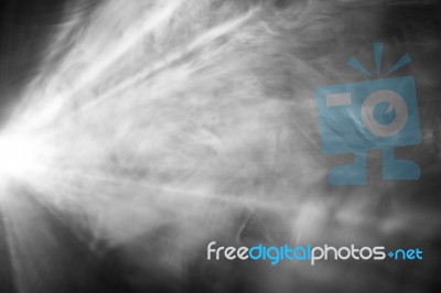 Beautiful Black And White Color Wide Lens Projector With Light Beam For Movie And Cinema At Night . Smoke Texture Spotlight . Screening For Multimedia . Abstract Background  Stock Photo