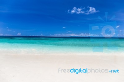 Beautiful Blue Sky Intersection Line White Sand Crystal Clear Sea Beach At Tachai Island, Andaman, Thailand Stock Photo