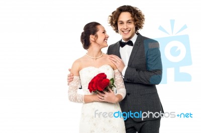 Beautiful Bride Looking At Her Man Stock Photo