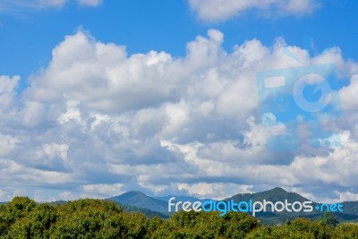 Beautiful Clouds With Mountains Stock Photo