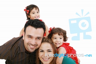 Beautiful Family Enjoying, Mom And Dad Playing With Their Daught… Stock Photo