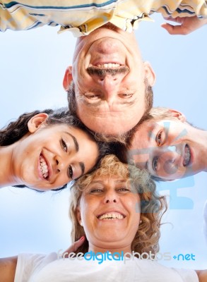 Beautiful Family. Heads Together Stock Photo