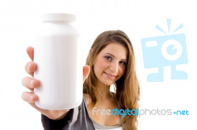 Beautiful Female Showing White Bottle Stock Photo