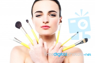 Beautiful Girl Holding Makeup Brushes Set Stock Photo