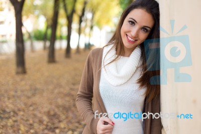 Beautiful Girl Looking At Camera In Autumn Stock Photo