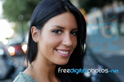 Beautiful Girl Posing At Camera In The City Stock Photo