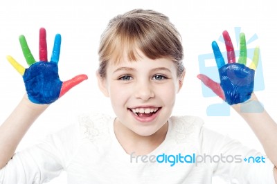 Beautiful Girl With Her Hands In The Paint Stock Photo
