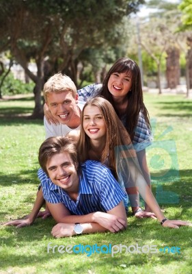 Beautiful Group Of Friends At The Park Stock Photo
