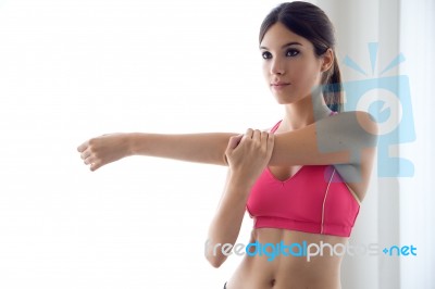 Beautiful Healthy Young Woman Doing Exercise At Home Stock Photo