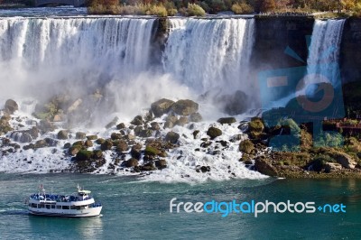 Beautiful Image With Amazing Niagara Waterfall And A Ship Stock Photo