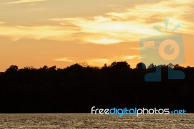 Beautiful Photo Of An Amazing Sunset On A Lake Stock Photo