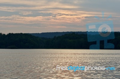 Beautiful Photo With The Lake And The Forest On The Sunset Stock Photo