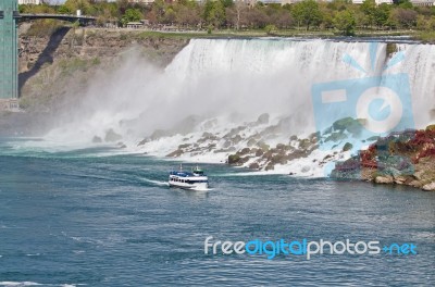 Beautiful Picture With A Ship And Amazing Niagara Waterfall Stock Photo