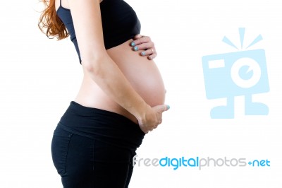 Beautiful Pregnant Woman Relaxing At Home Stock Photo