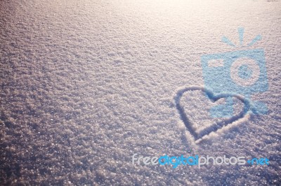 Beautiful Romantic Background With Heart On Snow Stock Photo