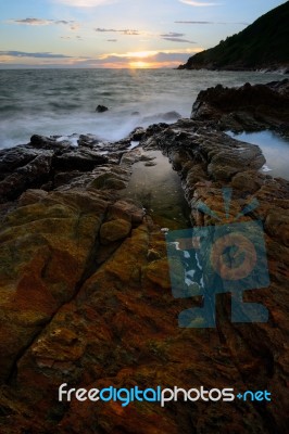 Beautiful Seascape Of Wave And Rock Stock Photo