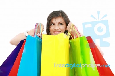 Beautiful Shopping Woman Holding Bags Isolated Over White Backgr… Stock Photo