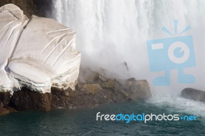 Beautiful Snow And The Waterfall Stock Photo