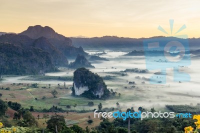 Beautiful Sun Rise Phulangka Mountain And The Mist Stock Photo