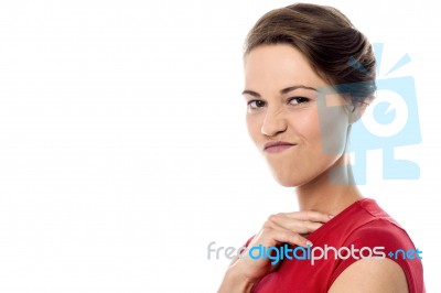 Beautiful Woman With Grimace On Her Face Stock Photo
