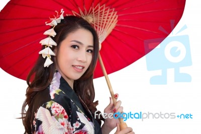 Beautiful Young Asian Woman Wearing Traditional Japanese Kimono With Red Umbrella Isolated On White Background Stock Photo