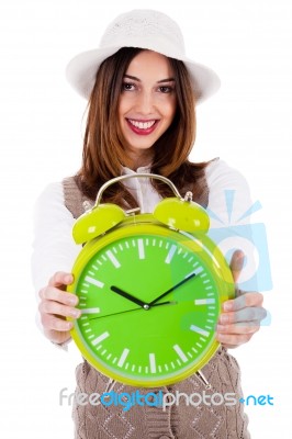 Beautiful Young Model With Hat And Showing Clock Stock Photo