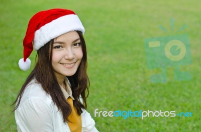 Beautiful Young Santa Claus Woman Stock Photo
