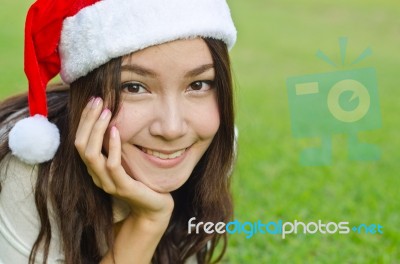 Beautiful Young Santa Clause Woman Stock Photo