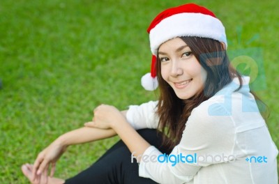 Beautiful Young Santa Clause Woman Stock Photo