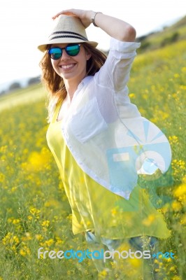 Beautiful Young Woman Enjoying Summer In A Field Stock Photo