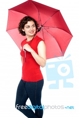 Beautiful Young Woman Holding An Umbrella Stock Photo
