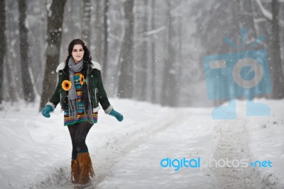 Beautiful Young Woman In A Sweater On A Winter Walk In A Park Stock Photo