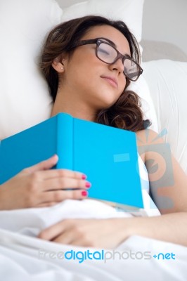 Beautiful Young Woman Sleeping After Read A Book Stock Photo