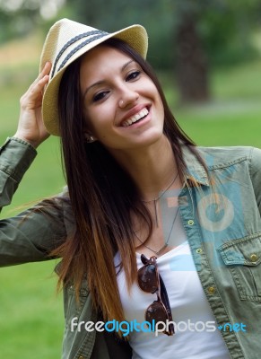 Beautiful Young Woman Walking In The Park Stock Photo