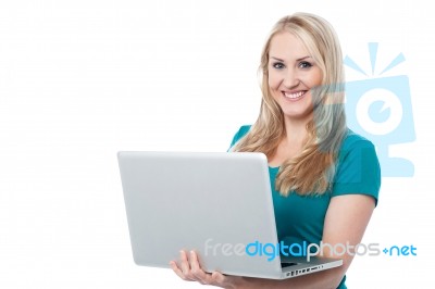 Beautiful Young Woman Working On Laptop Stock Photo