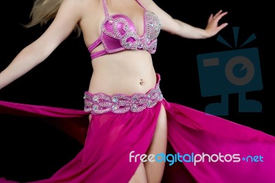 Beauty Dancer Posing In Traditional Pink Costume Stock Photo